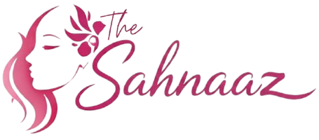Logo of 'The Sahnaaz' with a stylized face and pink hair on a white background